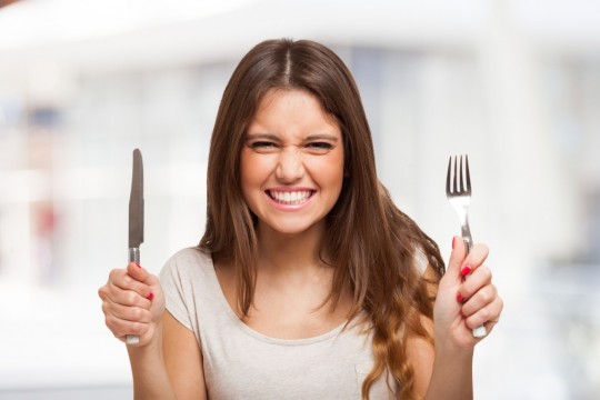 happy-woman-wiht-knife-and-fork-1024x683